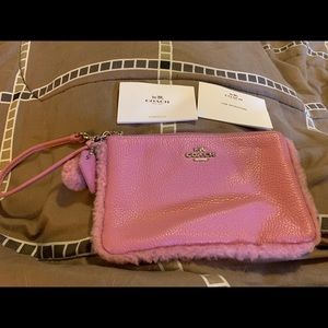Pink coach wristlet $25 barely used, like new